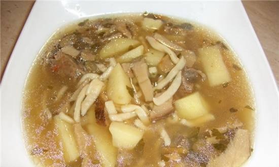 Mushroom soup in broth from boiling tongue
