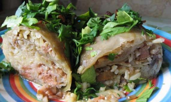 Cabbage rolls with rice, meat and quince