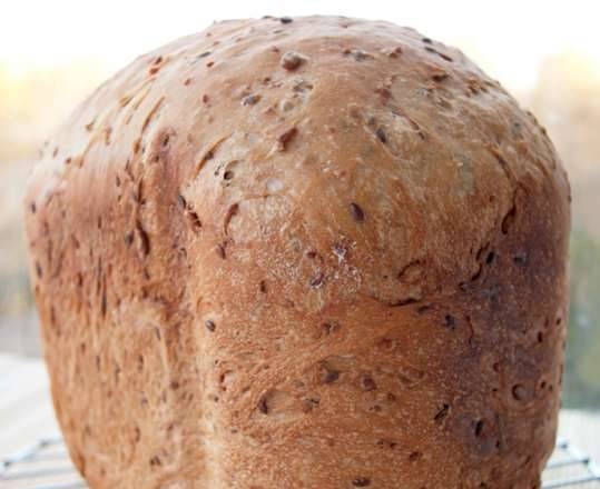 Wheat bread with flax, sesame and sunflower seeds in a bread maker