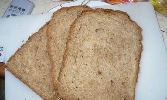 Wheat bread with whole grain flour and bran on yogurt