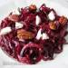 Beet spaghetti with goat cheese and pecans