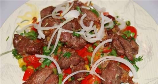 Baked pieces of lamb with vegetables