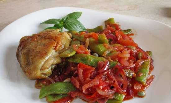 Green beans fried with onions and tomatoes