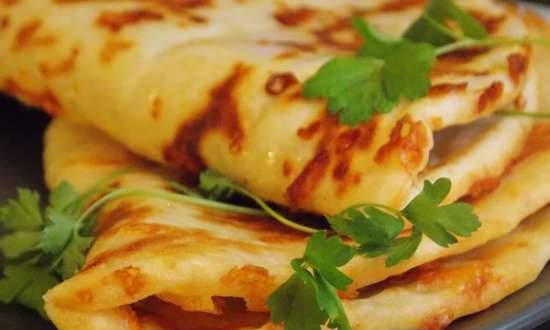 Khachapuri fast in a different manner in a contact grill VVK