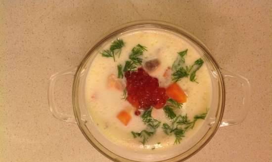 Cheese soup with red fish and red caviar