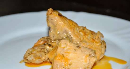 Chicken with mushrooms in tomato and sour cream sauce
