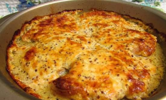 Pork loin steaks baked in sour cream sauce with mustard and cheese