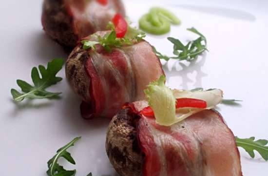 Champignons baked in bacon with nut-cheese filling