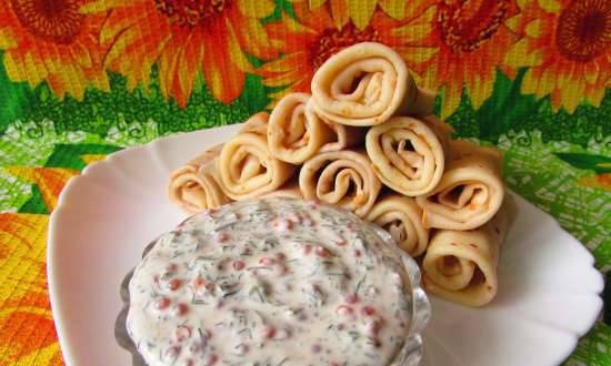 Sour cream sauce with red caviar for pancakes