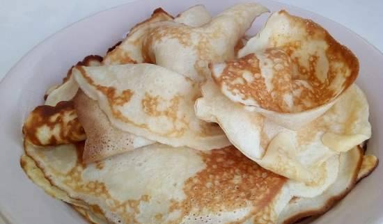 Thin pancakes with curdled milk