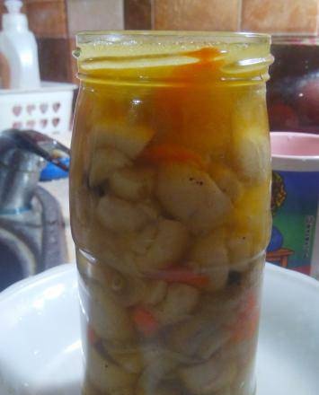Pickled champignons in their own juice