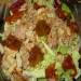 Chinese cabbage salad with cod liver, sun-dried tomatoes and croutons