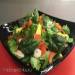 Salad with mango (pineapple) and honey-lime dressing - green fresh gourmet with Asian flavor