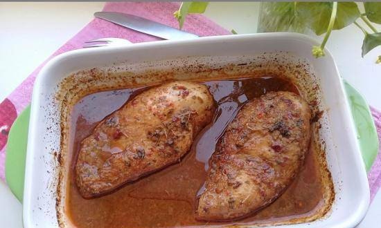 Oven baked chicken fillet with oregano