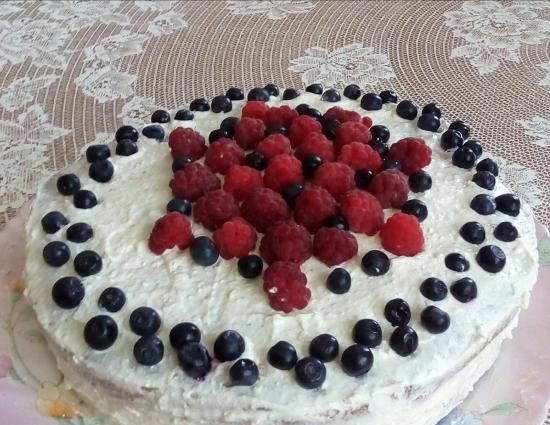Just a biscuit and a cake based on it with curd soufflé and berries (healthy food)