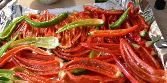 Hot chili pepper, dried in the oven, in fragrant oil