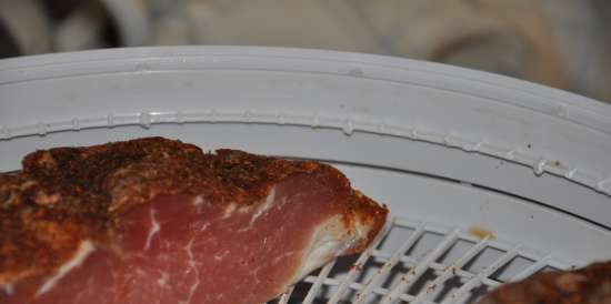 Dried pork fillet in an electric dryer