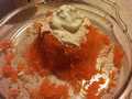 Grated carrots with sugar and sour cream