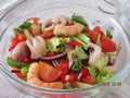 Vegetable salad with young octopus and shrimps