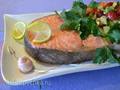 Poached salmon with avocado and strawberry salad