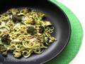 Broccoli noodles with pine nuts, garlic and cheese