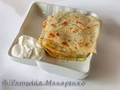 Indian Paratha flatbreads in the grill Jardeko