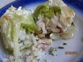 Squid cabbage rolls in creamy garlic sauce