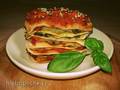 Whole wheat lasagna with tomato, celery and basil sauces in the oven