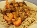 Shrimps and octopus with pumpkin, mushrooms, green onions and buckwheat noodles with Teriyaki sauce