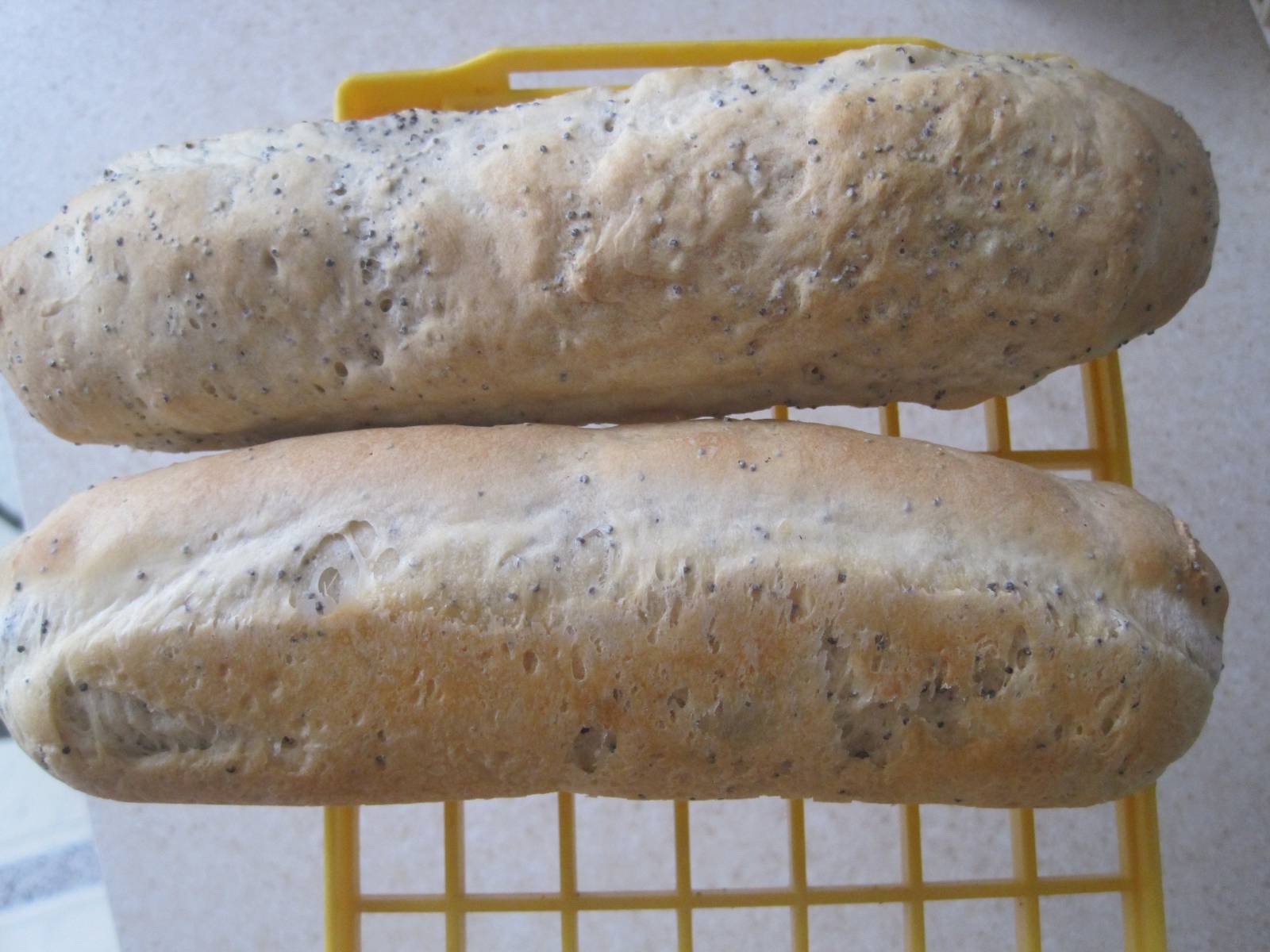 Mini cold dough baguettes in the oven